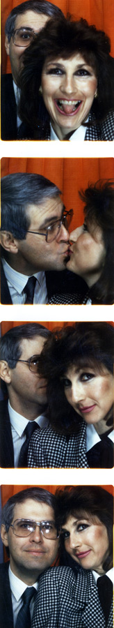 Marjorie and Craig in a photo booth somewhere.