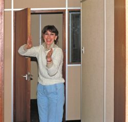 Marjorie enters into our new 9th floor offices in Tricorn House, Edgbaston, Birmingham. Photographed in the autumn of 1987, as we prepared to move from the bus barn on Waterworks Road.