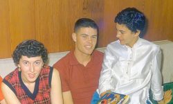 Bappy, my uncle Neil Moore, and my aunt Birdie sitting on the couch in our new home, 1080 Makaiwa Street