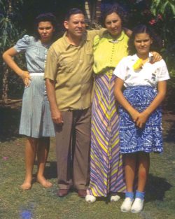 This is quite an old photograph -- pre WW2. My mother, on the left, looks positively wicked. Baba, Nana, and Birdie --- with a bright yellow flower.