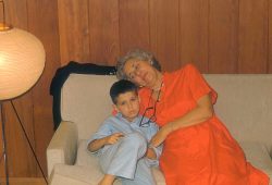 Nana and me. I look thrilled to bits to be photographed. She's keeping the evil eye on me. This was taken at our new house (then) at 1080 Makaiwa Street in Honolulu, I would guess in 1956.