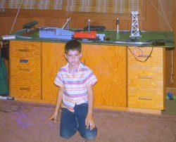 I had a special table for my train set, and, from the look on my face, I was none too pleased with something.