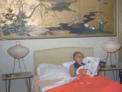 I am guessing that Baba took this photograph. I must have inherited this trait from him: I love annoying Marjorie by taking her photograph in bed, when she's trying to read or relax.