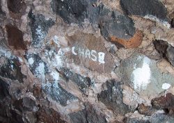 In circa 1979 we lived at one of the "Cenko" properties on Koko Head Avenue. I was cleaning paint brushes in the garage, and Chase was helping me. Her painting is still there. I painted her name in the midst of it all, and she adorned the "e."